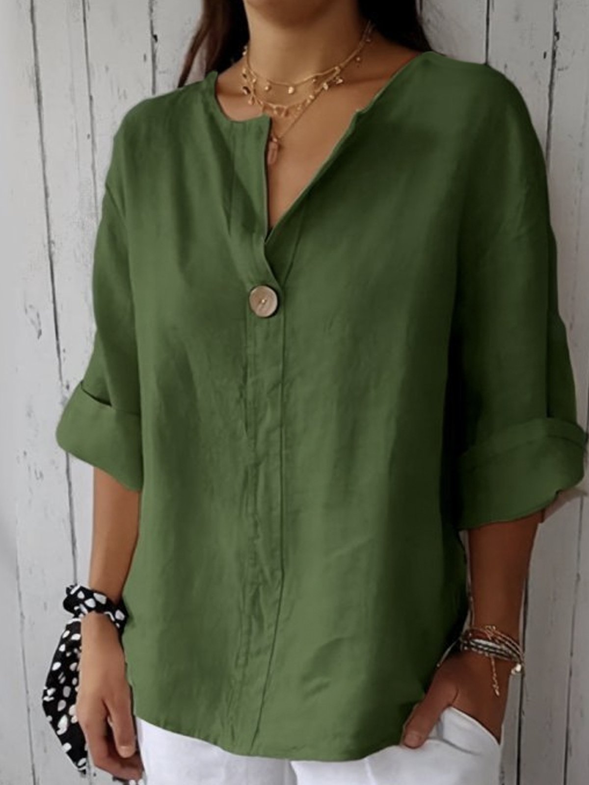 Damebluse med knaplukning