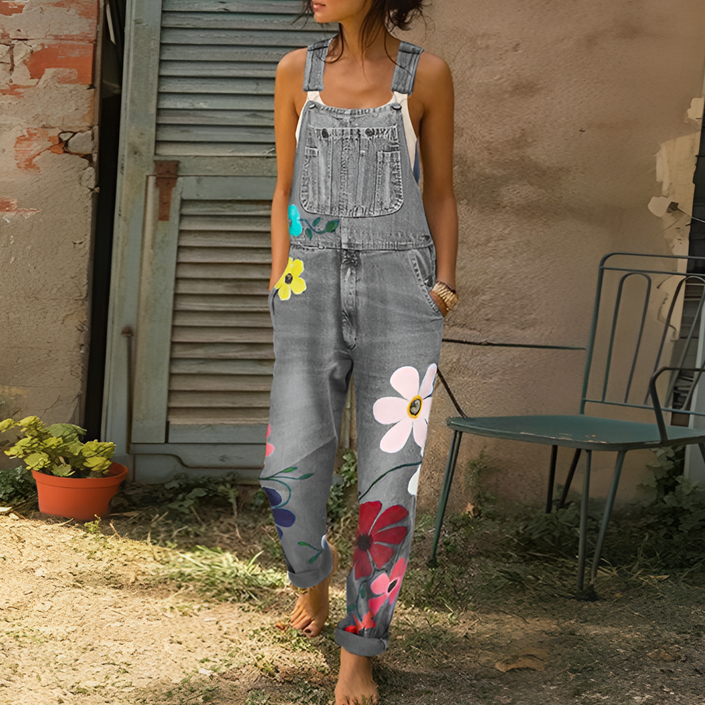Stilfuld denimbuksedragt med blomstermønster