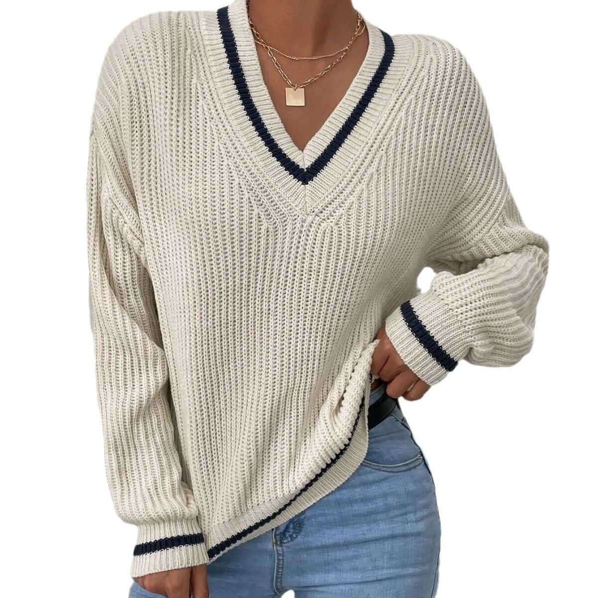 Stribet striktrøje med V-udskæring og løs pasform til damer