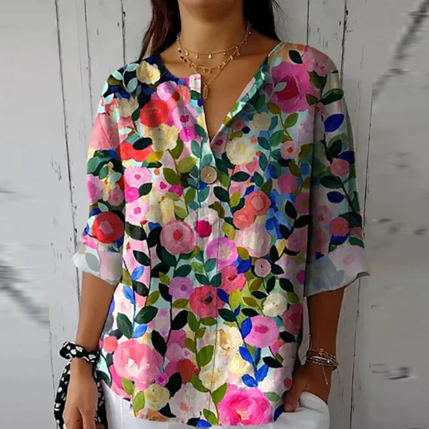 Blomstret damebluse med 3/4-ærmer