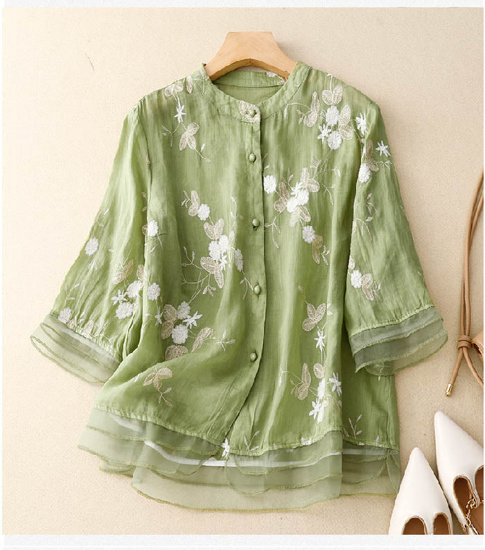 Blomstret gennemknappet damebluse