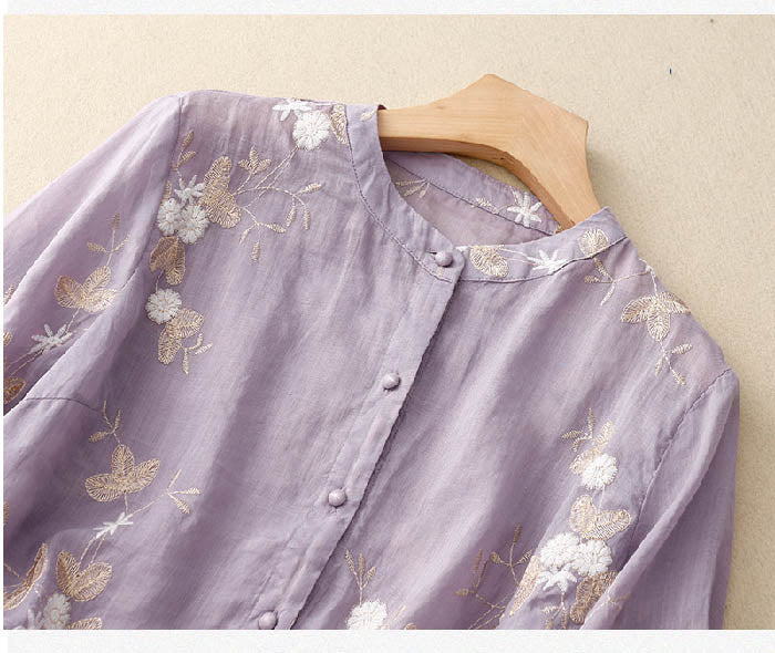 Blomstret gennemknappet damebluse
