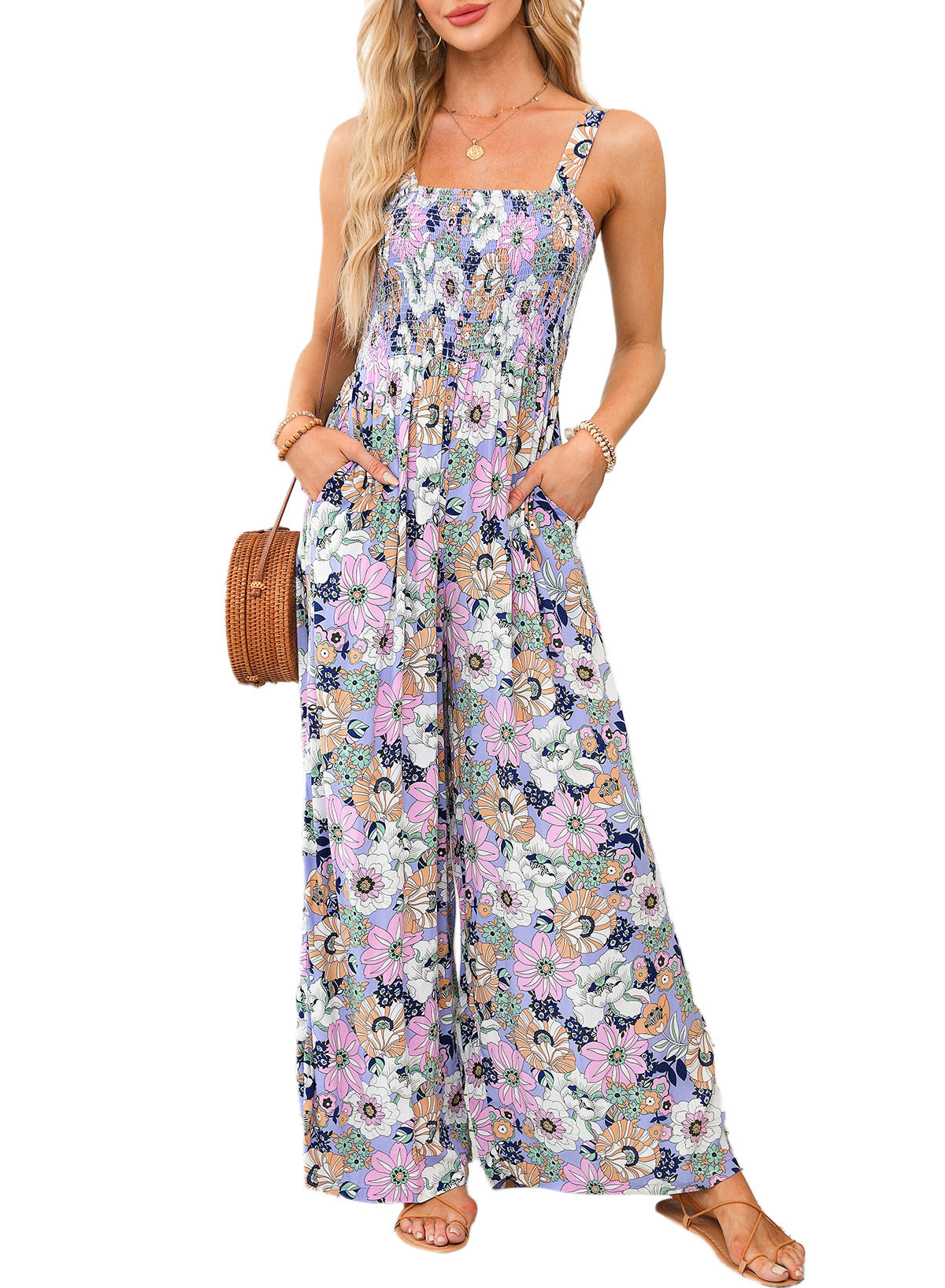 Blomstret smock-jumpsuit med brede ben til kvinder