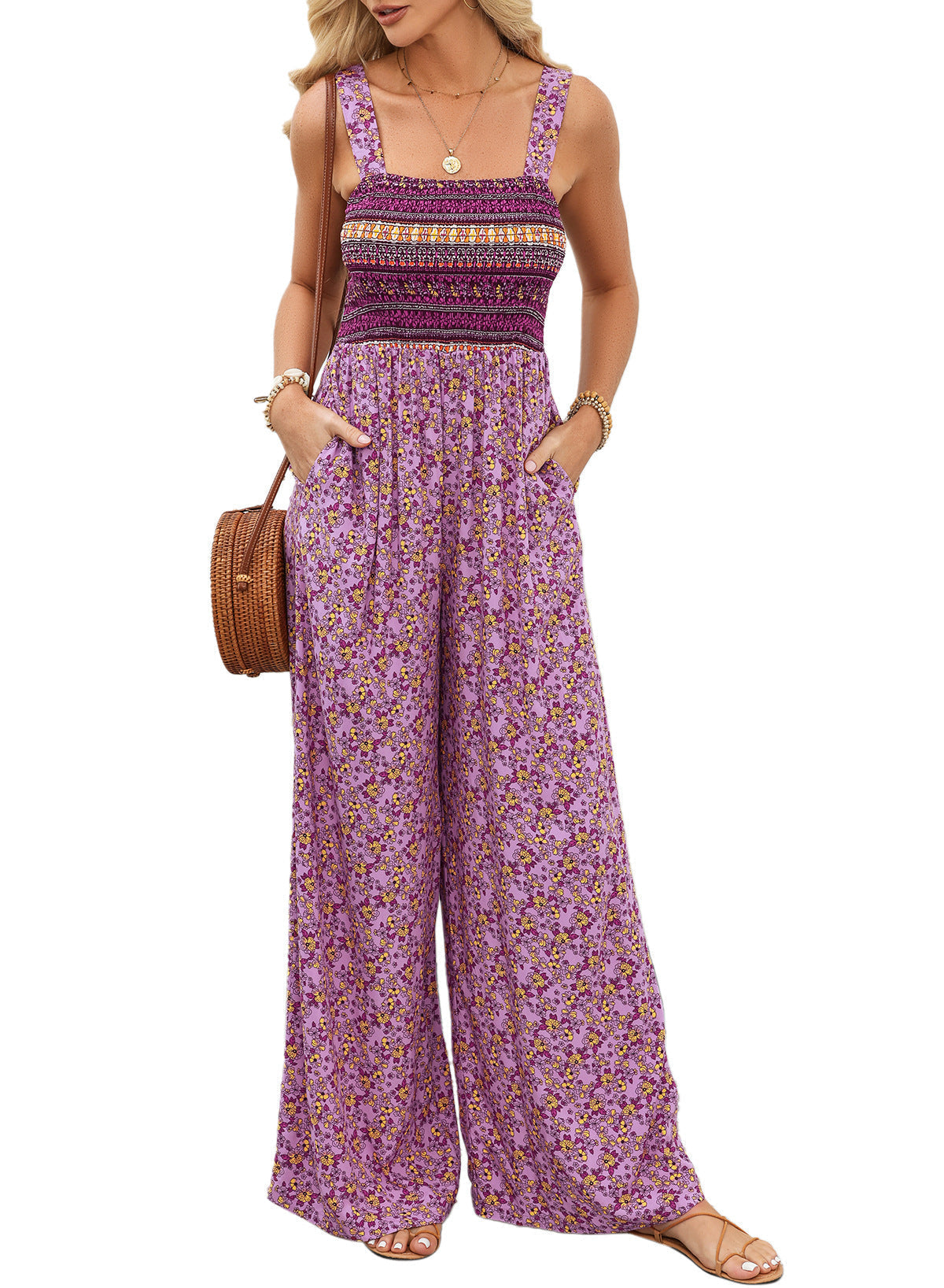 Blomstret smock-jumpsuit med brede ben til kvinder