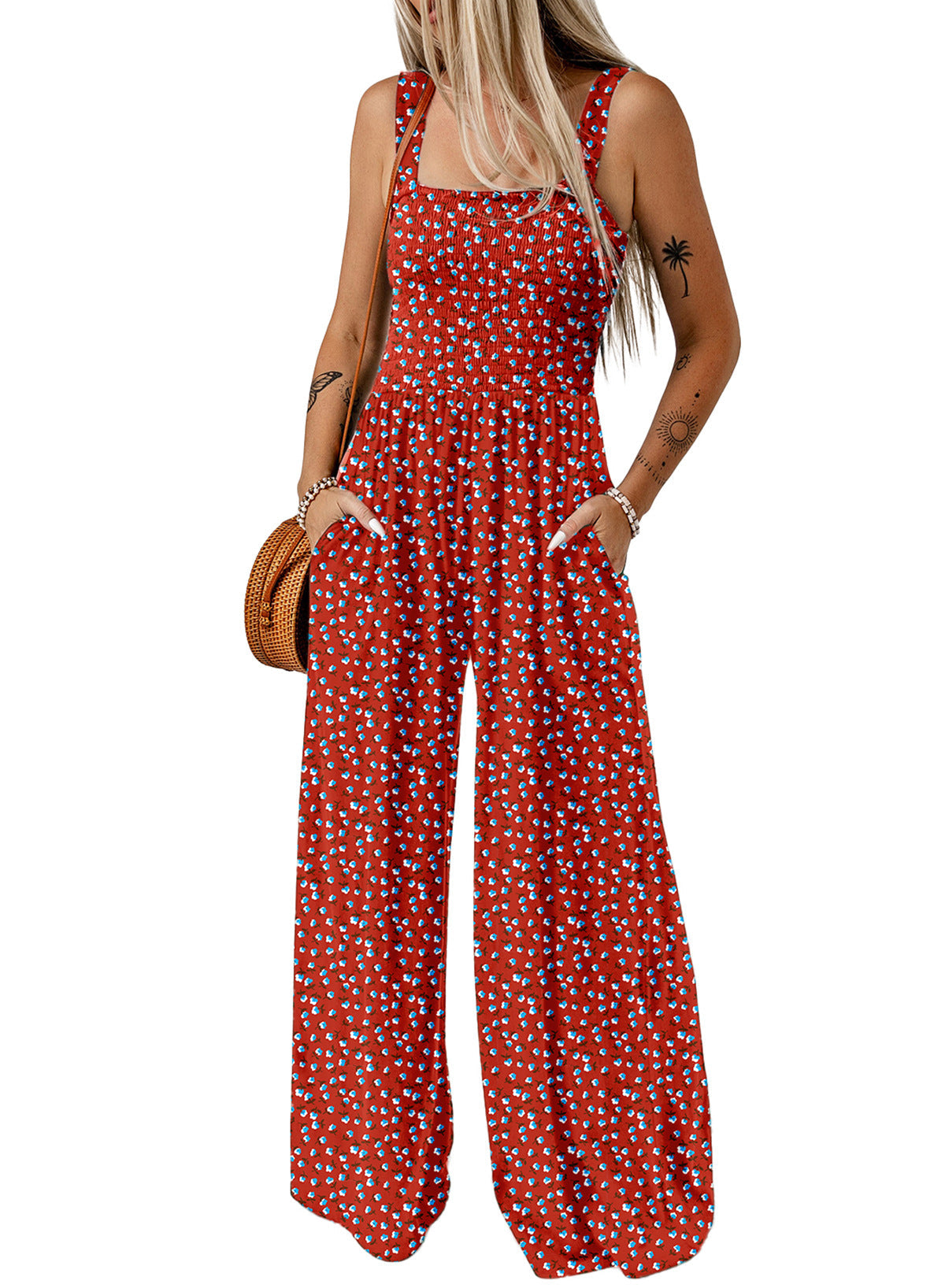 Blomstret smock-jumpsuit med brede ben til kvinder