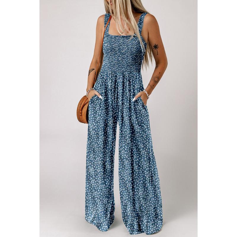 Blomstret smock-jumpsuit med brede ben til kvinder