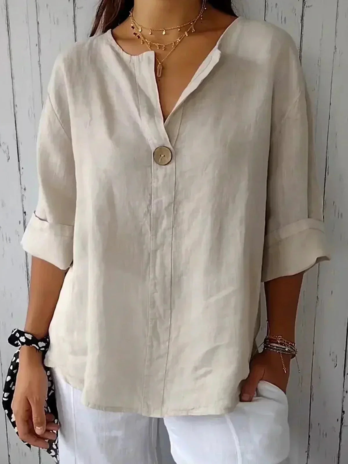 Damebluse med knaplukning