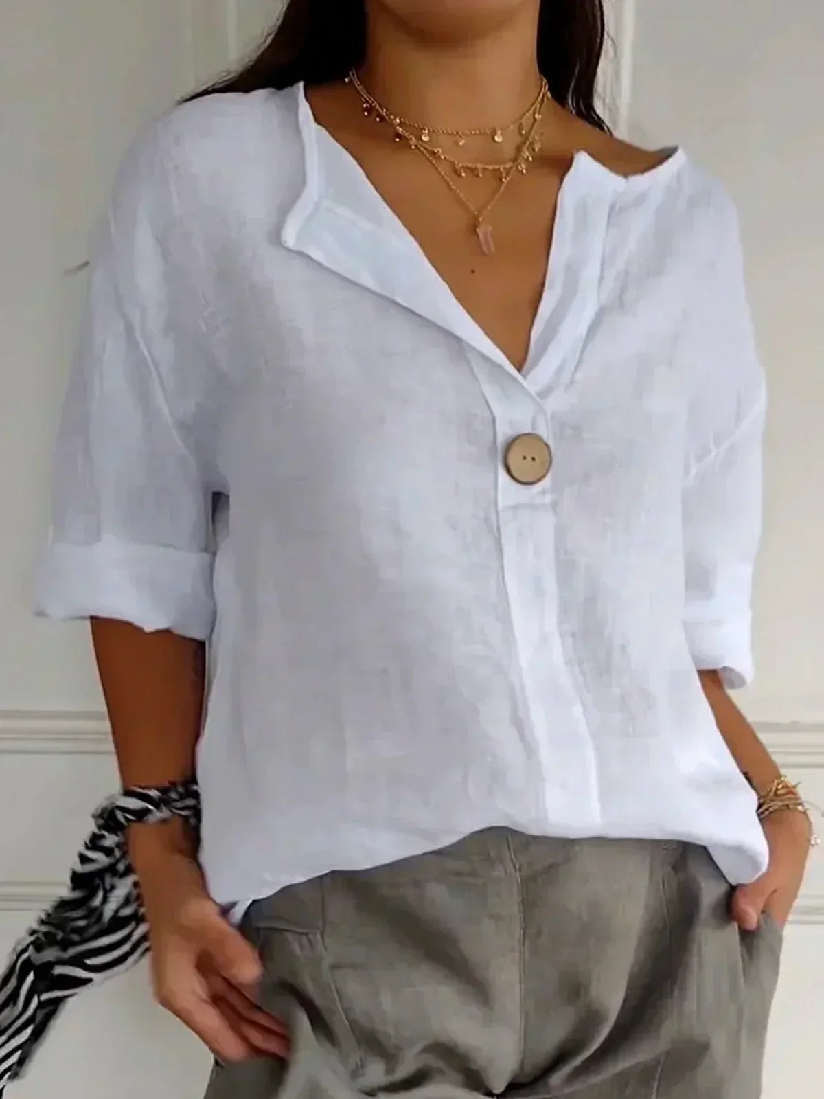 Damebluse med knaplukning