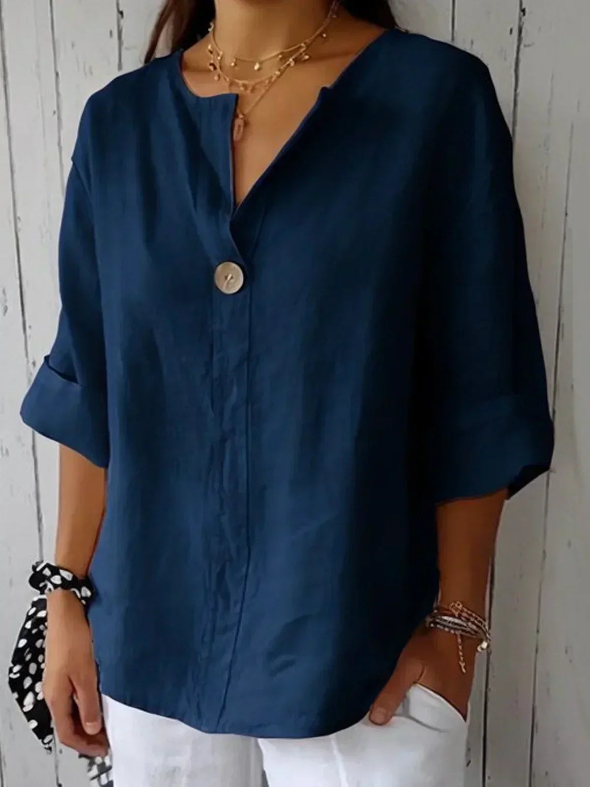 Damebluse med knaplukning