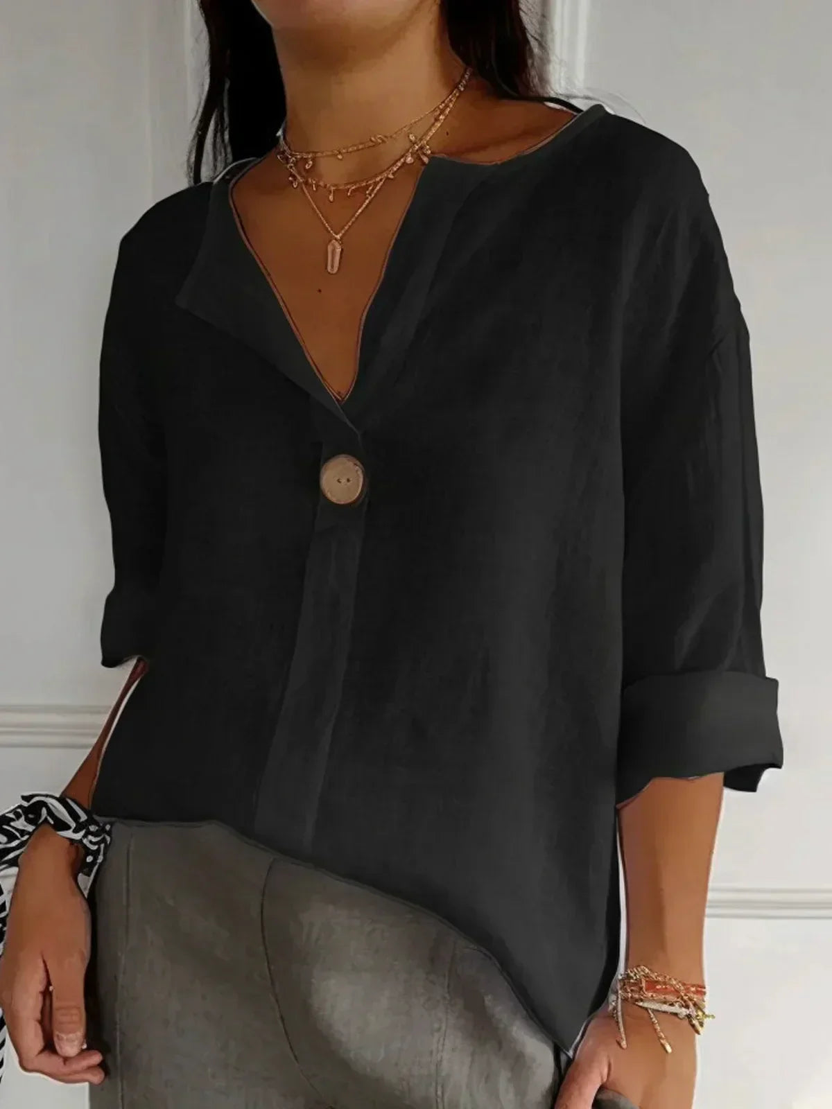 Damebluse med knaplukning