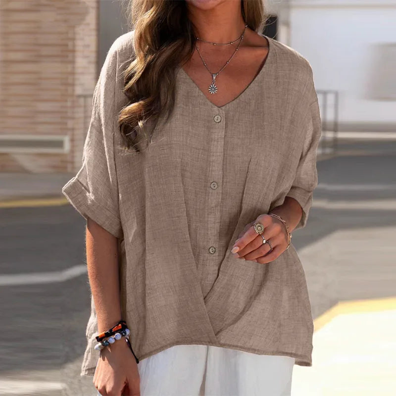 Damebluse med knapper