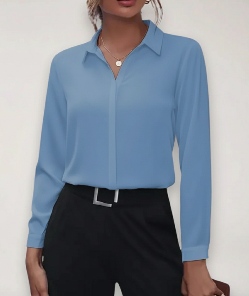 Damebluse med lange ærmer og knapper