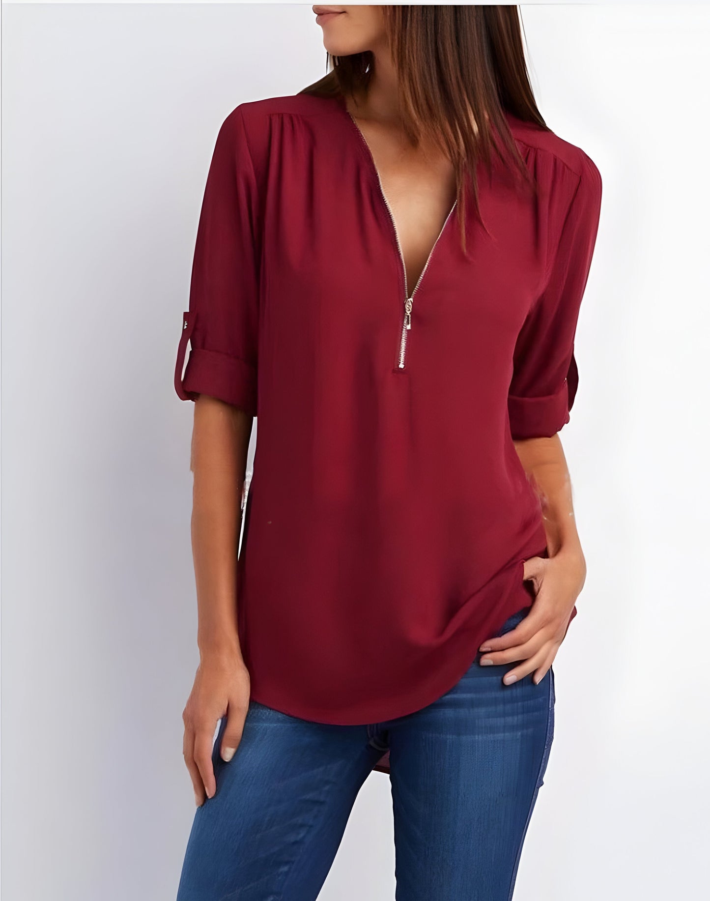 Damebluse med lynlås foran