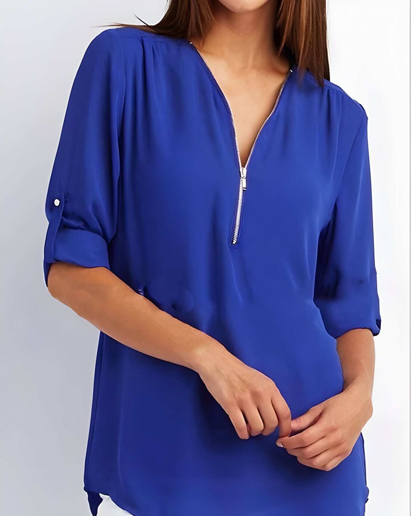 Damebluse med lynlås foran