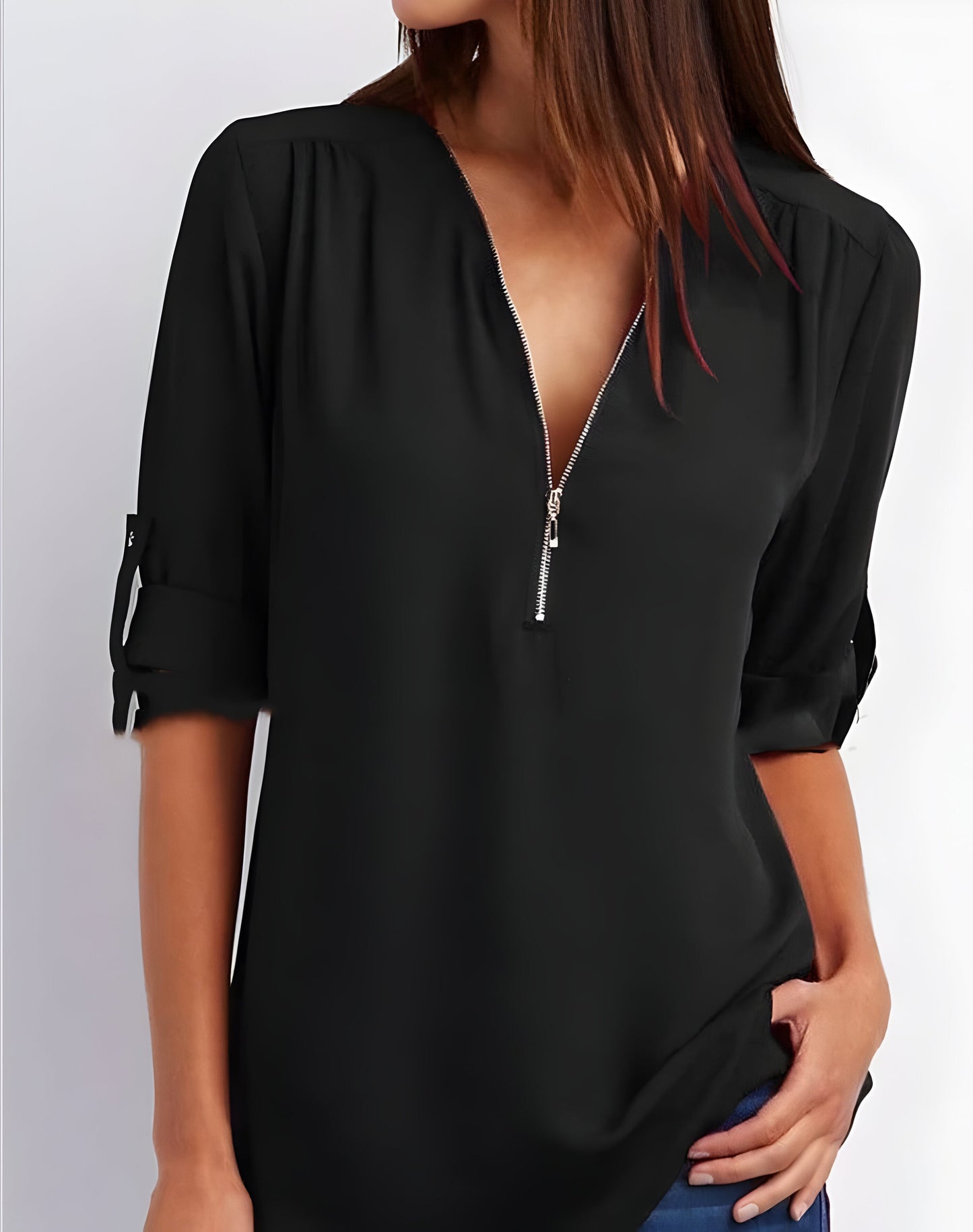 Damebluse med lynlås foran