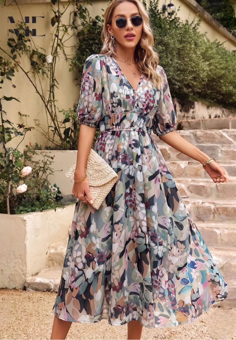 Elegant blomstret midikjole med pufærmer