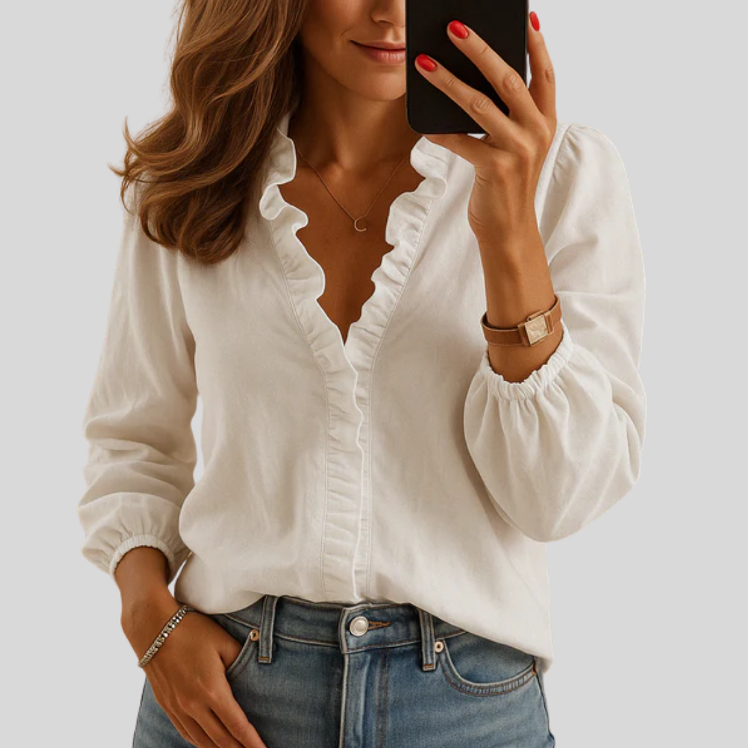 Elegant bluse med flæser