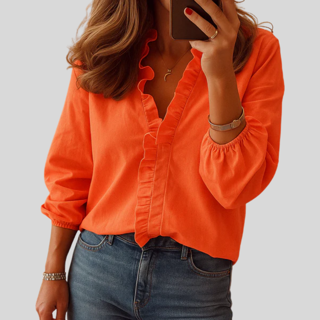 Elegant bluse med flæser