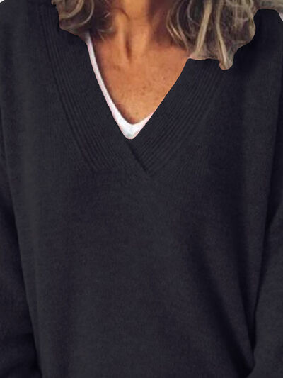 Elegant oversized striktrøje med V-udskæring til damer