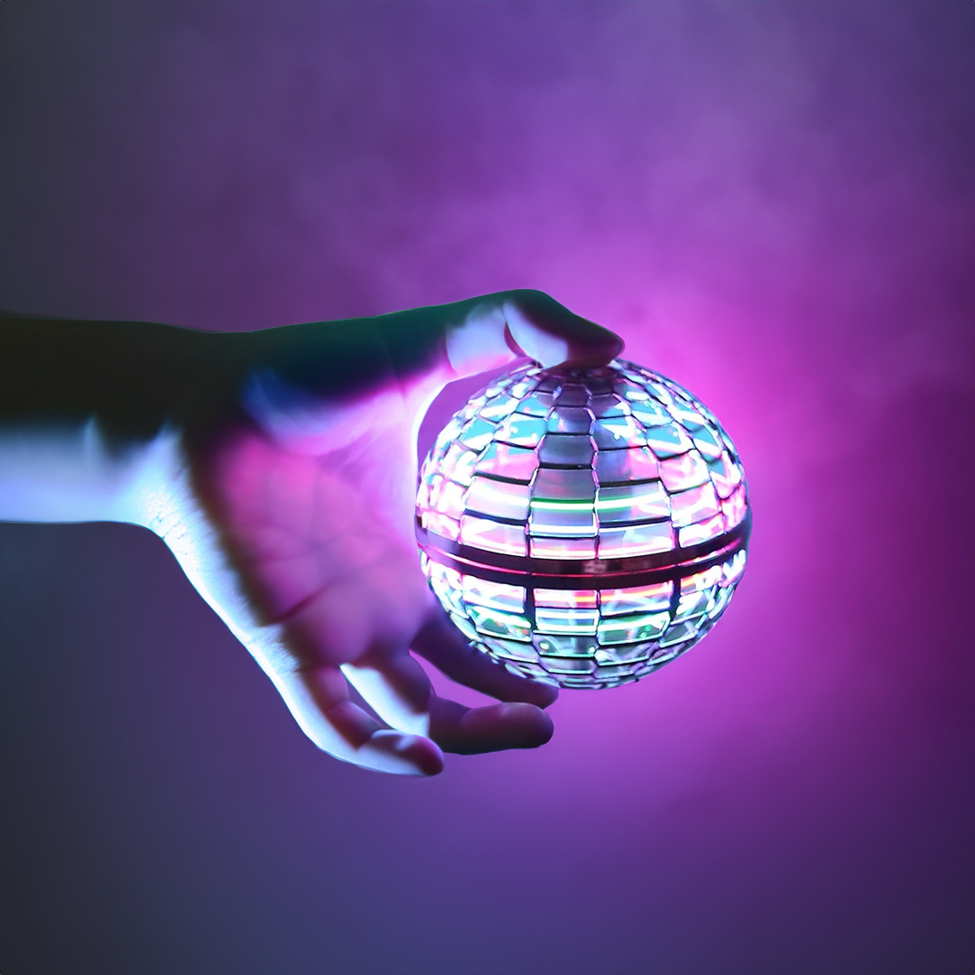 Flyvende orb-bold | Aerodynamisk flyvespinner med LED-effekter | 360° rotation og boomerangfunktion | Stødsikkert kabinet og USB-hurtigopladning
