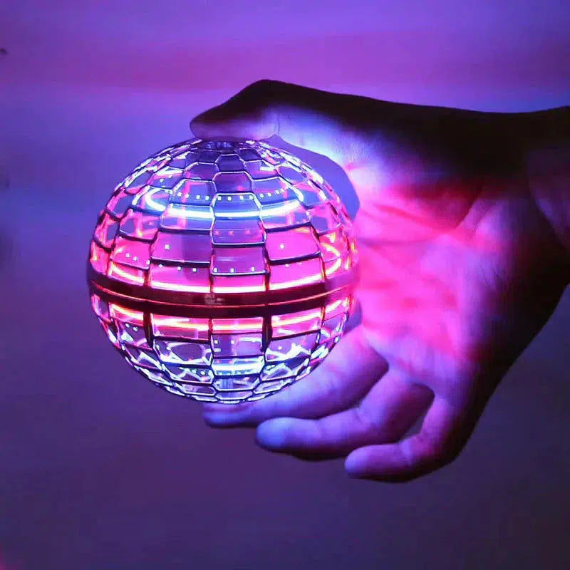 Flyvende orb-bold | Aerodynamisk flyvespinner med LED-effekter | 360° rotation og boomerangfunktion | Stødsikkert kabinet og USB-hurtigopladning