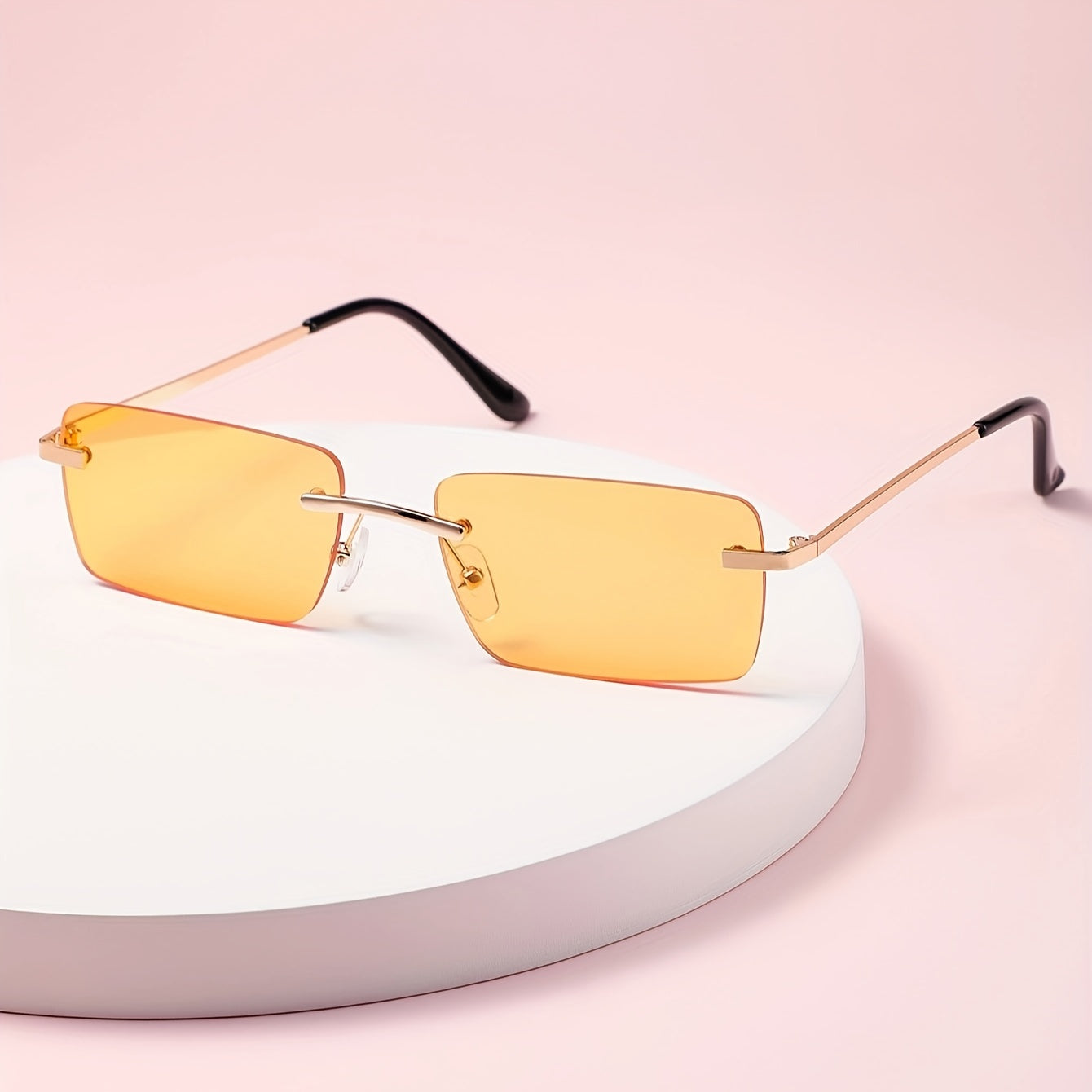 Herresolbriller med UV-beskyttelse og let metalstel – rammeløst design