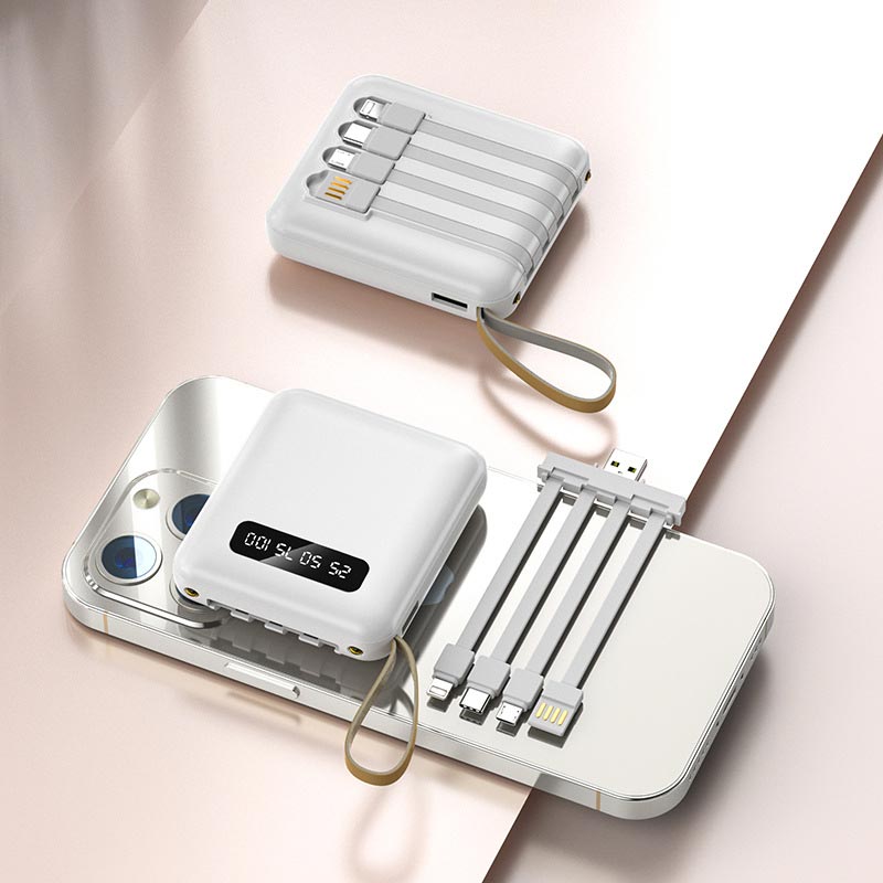Hurtigopladende 20.000 mAh mini powerbank med integrerede kabler