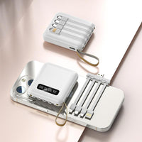 Hurtigopladende 20.000 mAh mini powerbank med integrerede kabler