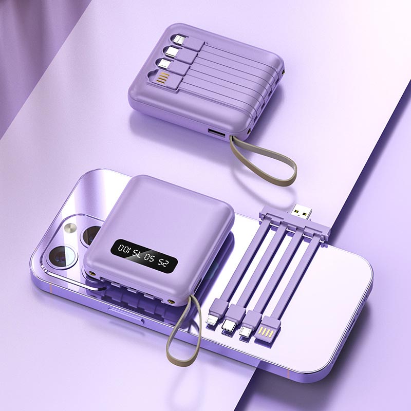 Hurtigopladende 20.000 mAh mini powerbank med integrerede kabler