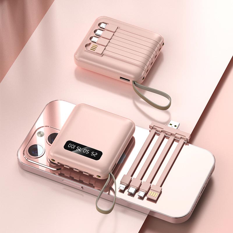 Hurtigopladende 20.000 mAh mini powerbank med integrerede kabler