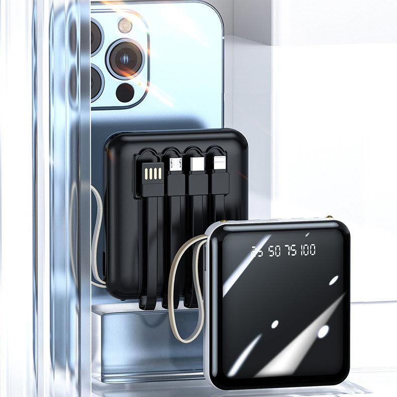 Hurtigopladende 20.000 mAh mini powerbank med integrerede kabler