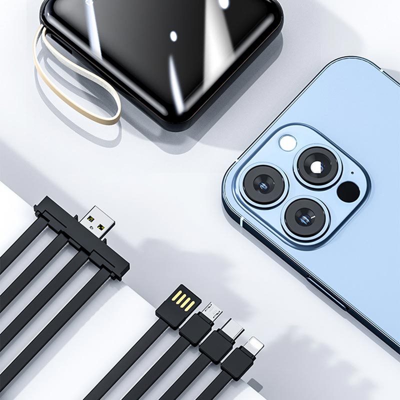 Hurtigopladende 20.000 mAh mini powerbank med integrerede kabler