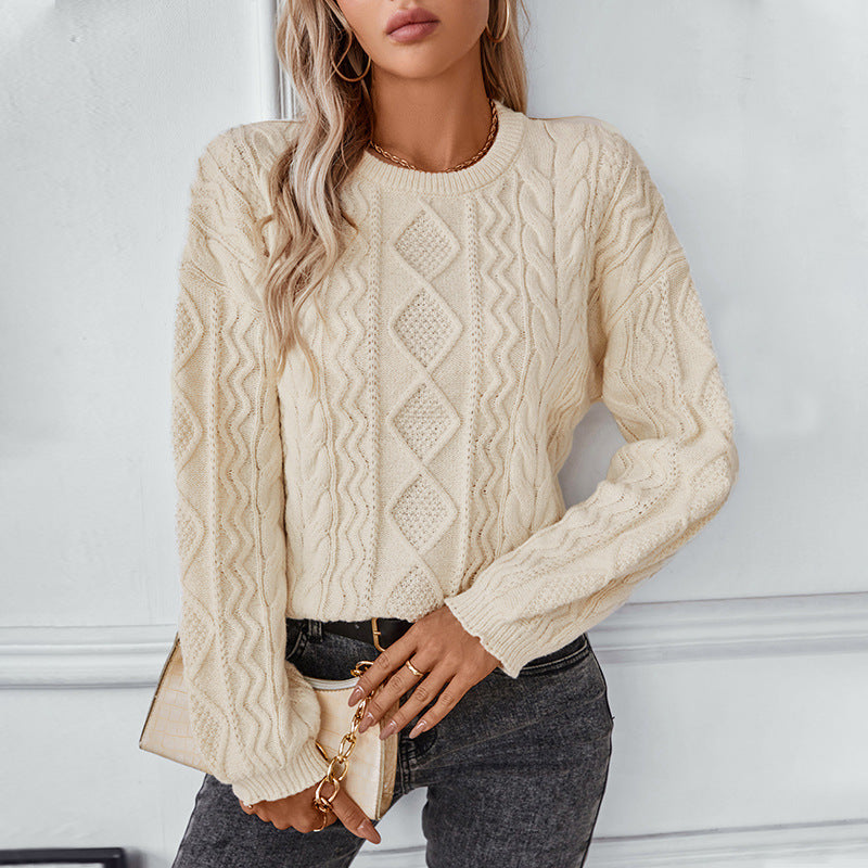 Kabelstrikket langærmet sweater til damer