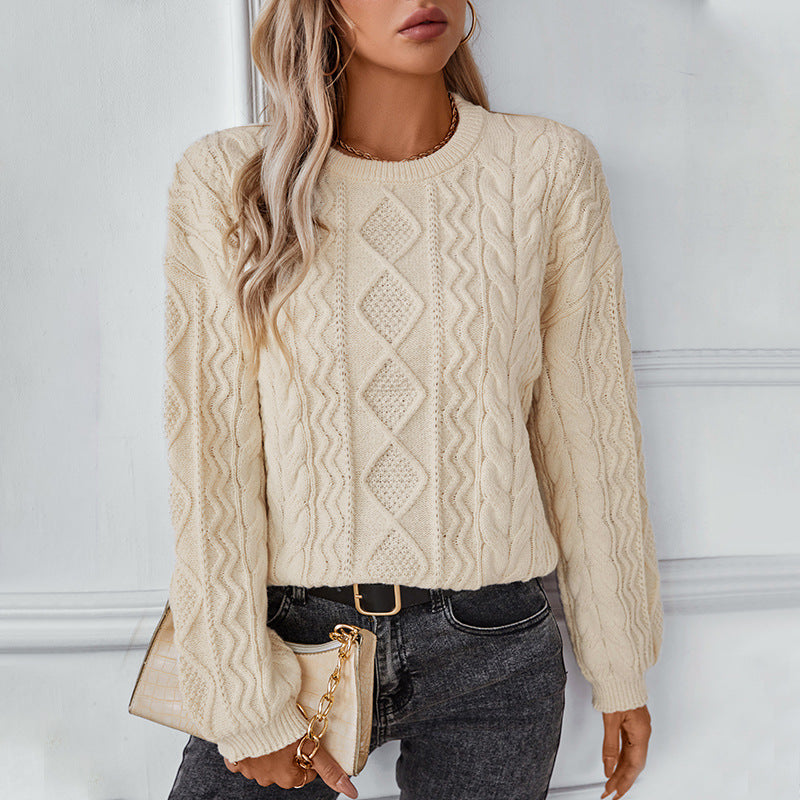 Kabelstrikket langærmet sweater til damer