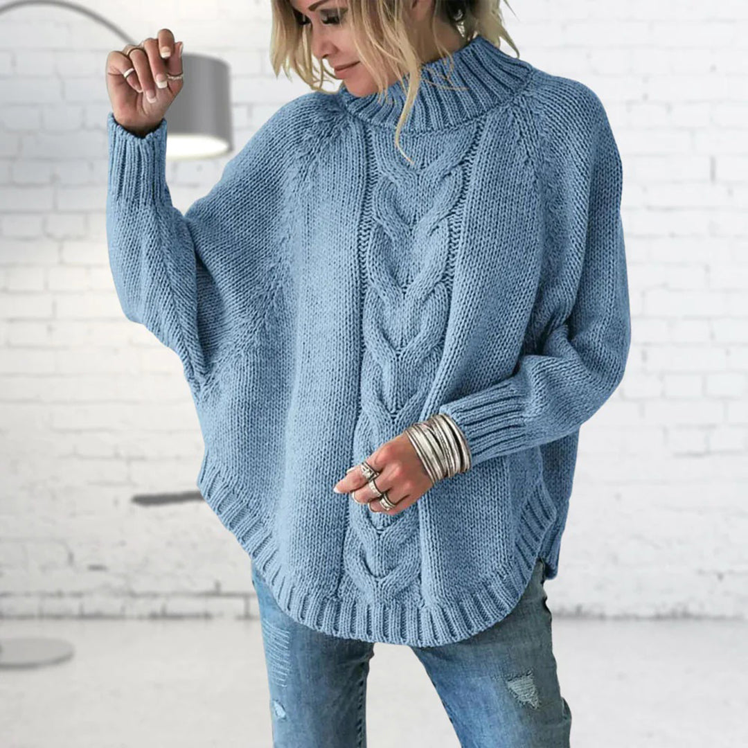 Kabelstrikket rullekravesweater med flagermusærmer til damer