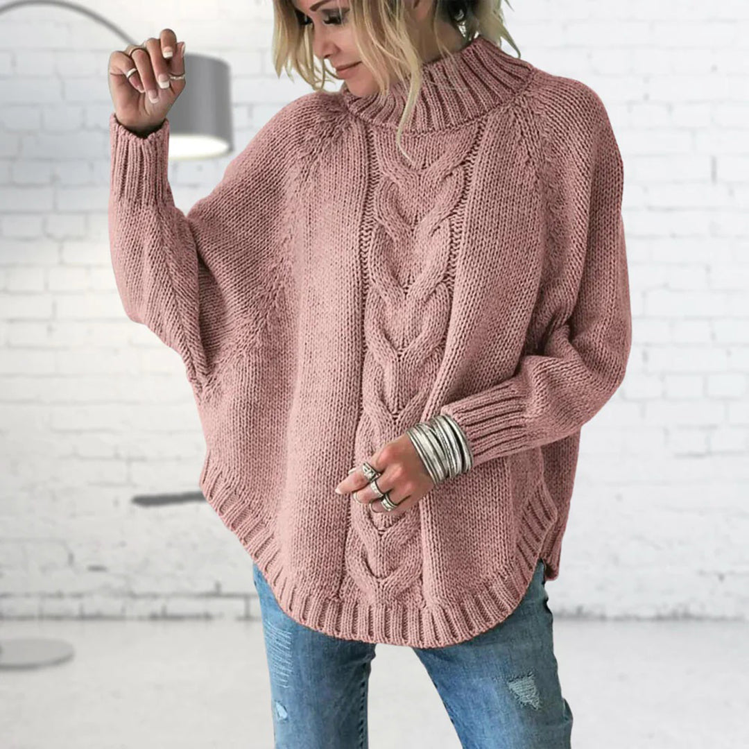 Kabelstrikket rullekravesweater med flagermusærmer til damer