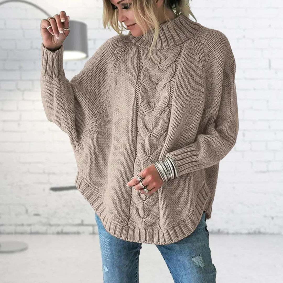 Kabelstrikket rullekravesweater med flagermusærmer til damer