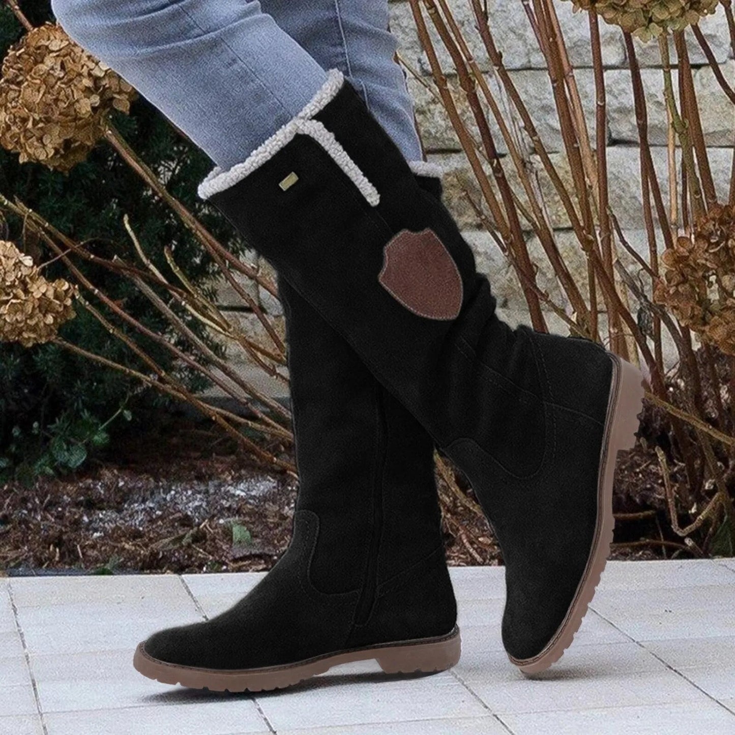 Knæhøje damestøvler med shearling-kant