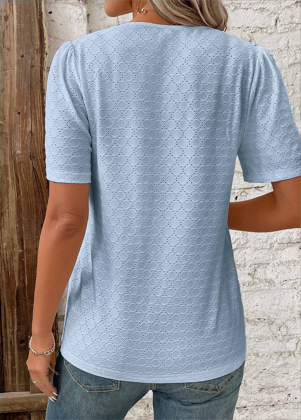 Kortærmet damebluse med knaplukning