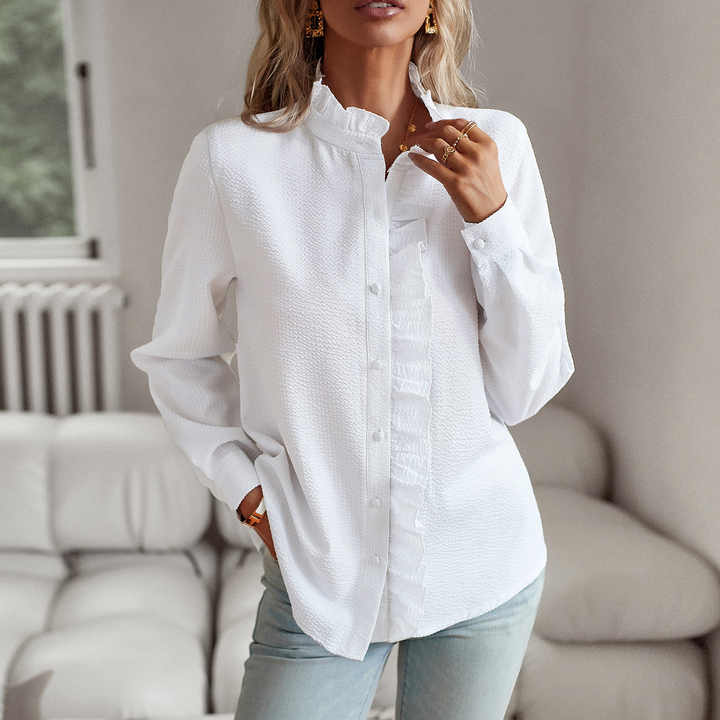Langærmet damebluse med volanger