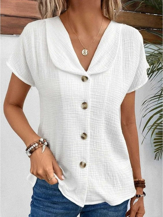 Struktureret damebluse med knapper