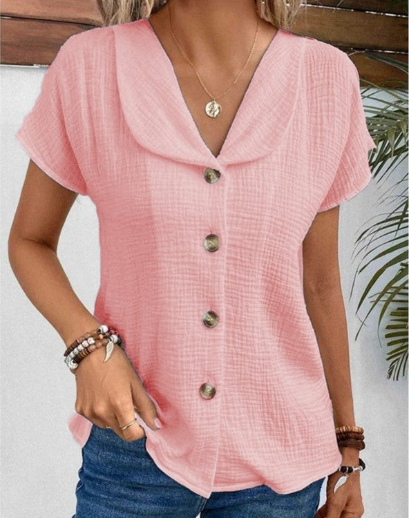 Struktureret damebluse med knapper