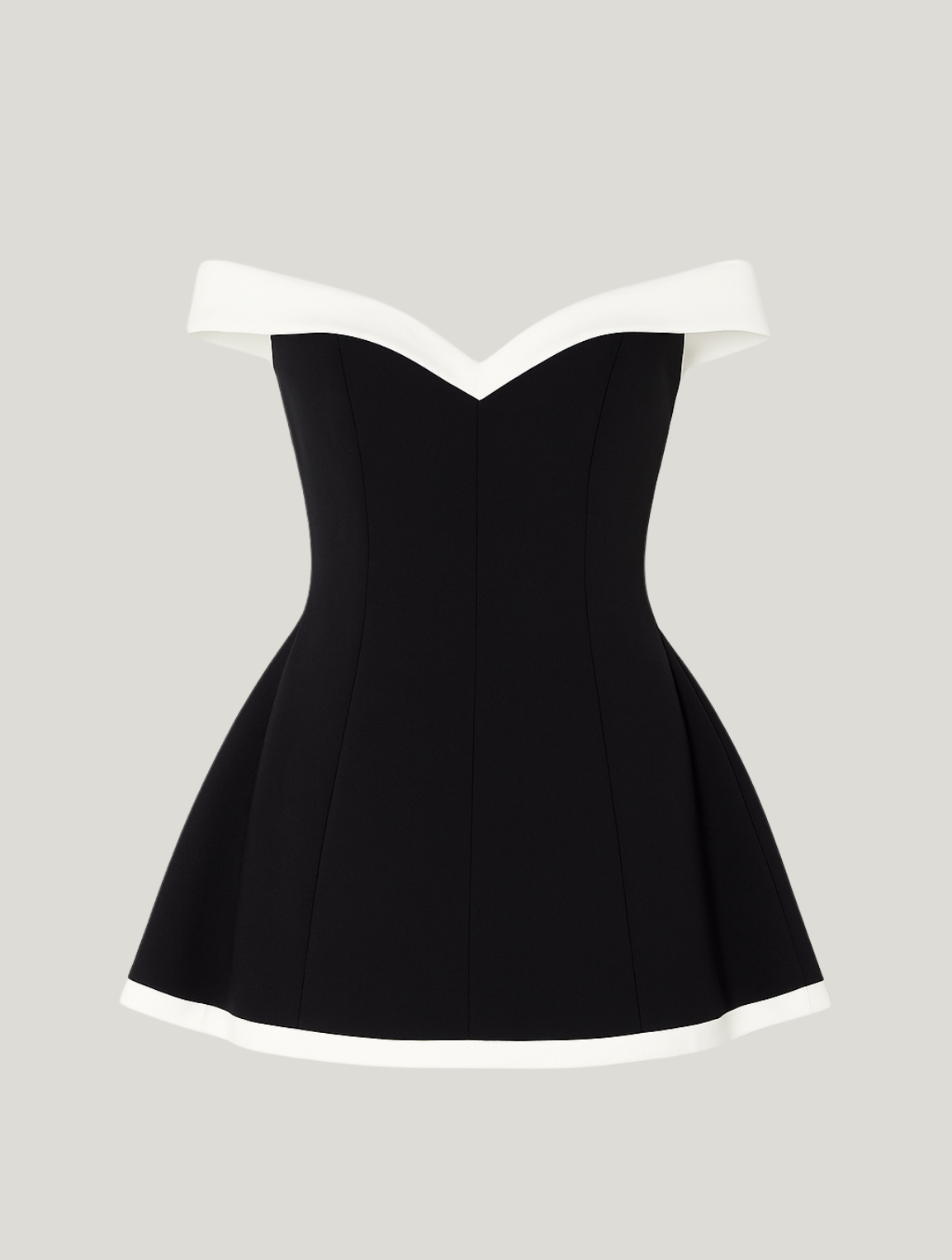 Tidløs off-shoulder minikjole med kontrast