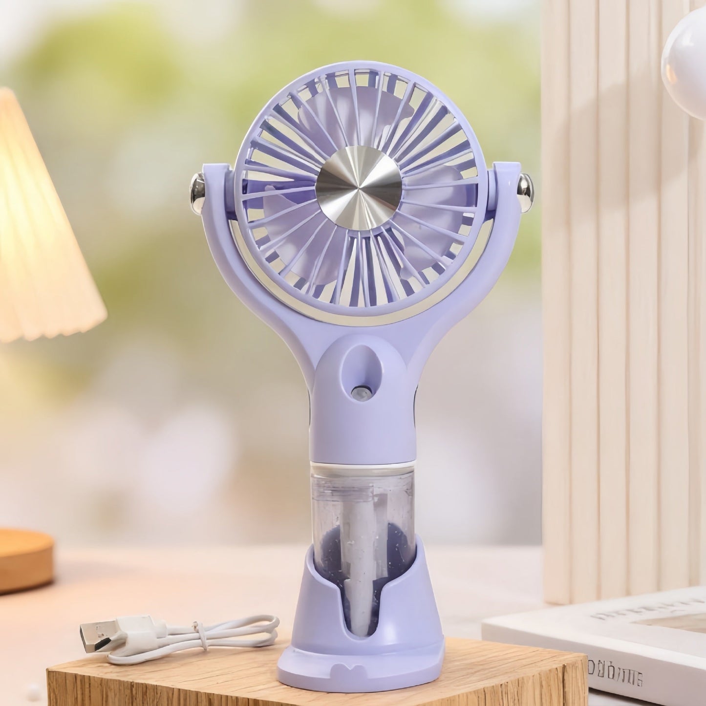Unisex bærbar håndventilator med spray, USB-opladning og ergonomisk design