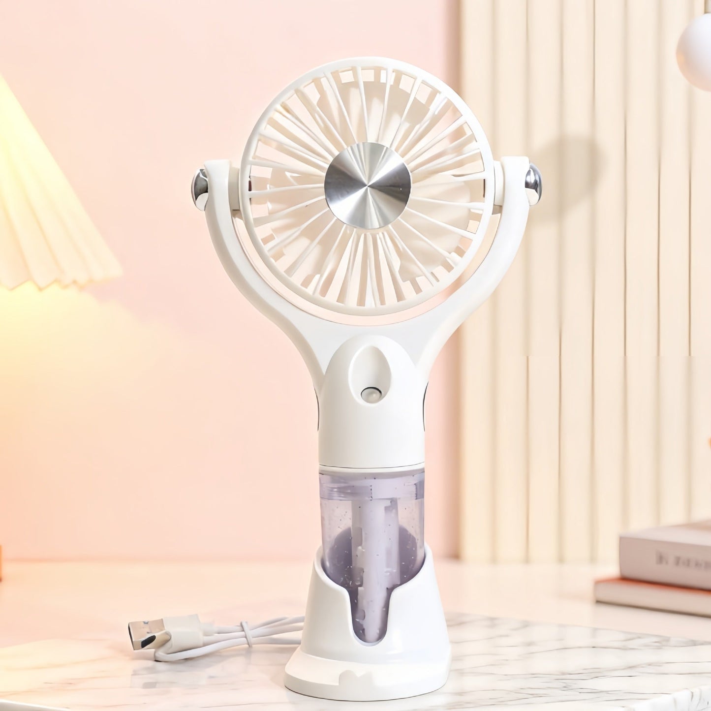 Unisex bærbar håndventilator med spray, USB-opladning og ergonomisk design