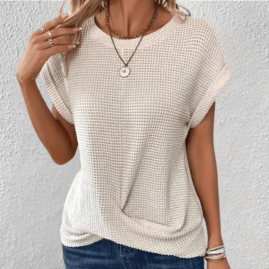 Vaffelstrikket damebluse med twist foran