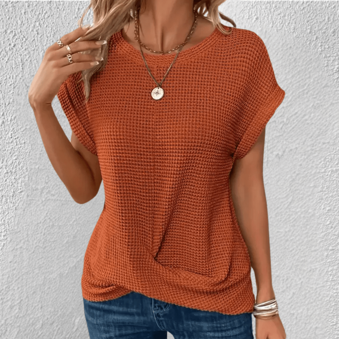 Vaffelstrikket damebluse med twist foran