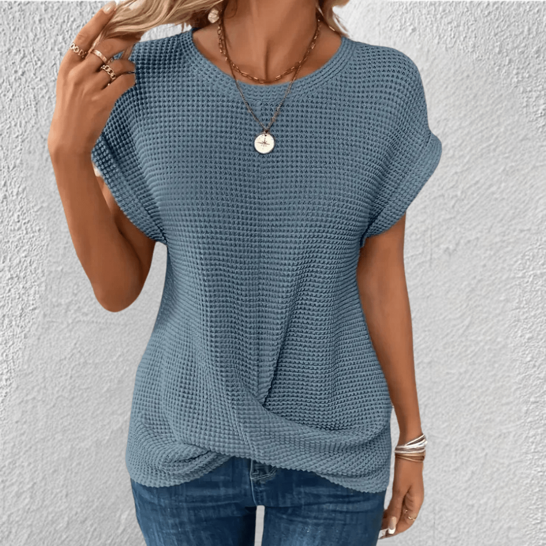 Vaffelstrikket damebluse med twist foran