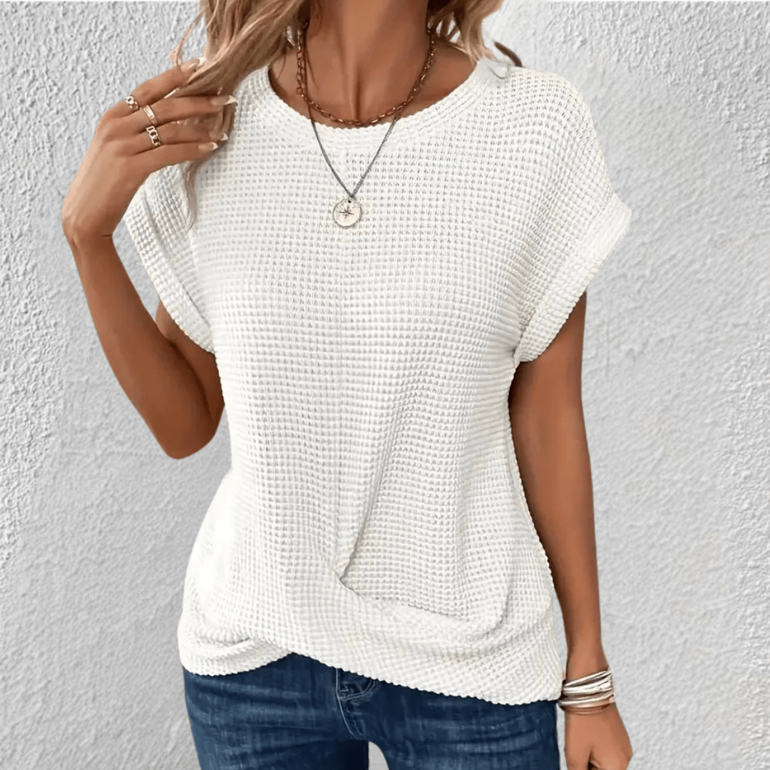 Vaffelstrikket damebluse med twist foran